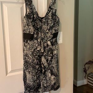 Cute cocktail dress.  Snakeskin like print.